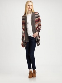 Contrasting, western-inspired stripes invigorate this lengthy sweater jacket with an asymmetrical hem and touch of wool. Contrasting shawl collarLong sleevesRibbed cuffs and asymmetrical hemAbout 27 from shoulder to hem50% acrylic/30% wool/20% nylonHand washImportedModel shown is 5'9½ (176cm) wearing US size Small.OUR FIT MODEL RECOMMENDS ordering true size. Contrasting, western-inspired stripes invigorate this lengthy sweater jacket with an asymmetrical hem and touch of wool. Contrasting shawl collarLong sleevesRibbed cuffs and asymmetrical hemAbout 27 from shoulder to hem50% acrylic/30% wool/20% nylonHand washImportedModel shown is 5'9½ (176cm) wearing US size Small.OUR FIT MODEL RECOMMENDS ordering true size.