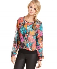 From the vivid burst of print to the draped hem that dips low at the back, memorable design reigns on XOXO's whimsical chiffon top. From the vivid burst of print to the draped hem that dips low at the back, memorable design reigns on XOXO's whimsical chiffon top.