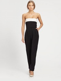 A sculptural contrast back bow lends graphic allure to this strapless one-piece style.Banded strapless necklineSide slash pocketsFront pleatsLow back with bow detailConcealed side zipSilk liningAbout 52 longSilkDry cleanMade in Italy of imported fabricModel shown is 5'8 (173cm) wearing US size 4. A sculptural contrast back bow lends graphic allure to this strapless one-piece style.Banded strapless necklineSide slash pocketsFront pleatsLow back with bow detailConcealed side zipSilk liningAbout 52 longSilkDry cleanMade in Italy of imported fabricModel shown is 5'8 (173cm) wearing US size 4.