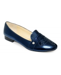 An easy style gets glam. Metallic leather upper of Ivanka Trump's Harriet loafer flats gives them a great sheen that makes the perforated detail on the vamp really stand out. An easy style gets glam. Metallic leather upper of Ivanka Trump's Harriet loafer flats gives them a great sheen that makes the perforated detail on the vamp really stand out.