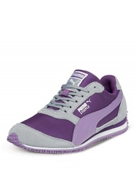An update on PUMA's heritage running shoe, the Steeple Jr. blends aggressive topstitching, tonal mesh panels and synthetic overlays for a lightweight shoe that looks as good as it feels. An update on PUMA's heritage running shoe, the Steeple Jr. blends aggressive topstitching, tonal mesh panels and synthetic overlays for a lightweight shoe that looks as good as it feels.