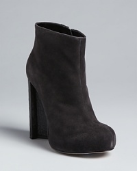 These beyond-basic Alejandro Ingelmo platform booties feature sensual suede contrasted with geometric, architectural heels in croc-embossed leather. These beyond-basic Alejandro Ingelmo platform booties feature sensual suede contrasted with geometric, architectural heels in croc-embossed leather.