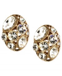 A tiny treasure from Jones New York. These button earrings add big sparkle with clear stones on a golden base. Crafted in worn gold tone mixed metal. Approximate diameter: 1/2 inch. A tiny treasure from Jones New York. These button earrings add big sparkle with clear stones on a golden base. Crafted in worn gold tone mixed metal. Approximate diameter: 1/2 inch.