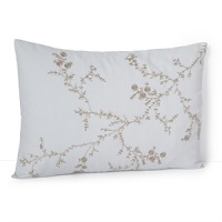 Delicately embroidered flower vines dance across this decorative pillow from Vera Wang. Delicately embroidered flower vines dance across this decorative pillow from Vera Wang.