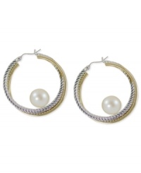 Abstract elegance. Cultured freshwater pearls (7-1/2-8 mm) stand at the center of 14k gold and sterling silver hoop earrings for a bit of postmodern appeal. Approximate diameter: 1-1/4 inches. Abstract elegance. Cultured freshwater pearls (7-1/2-8 mm) stand at the center of 14k gold and sterling silver hoop earrings for a bit of postmodern appeal. Approximate diameter: 1-1/4 inches.