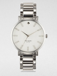 A sleek timepiece in a stainless steel accented with sparkling crystals. Quartz movementWater resistant to 3 ATMRound stainless steel case, 38mm (1.5)Smooth bezelWhite dialCrystal accented hour markersSecond hand Stainless steel link braceletImported A sleek timepiece in a stainless steel accented with sparkling crystals. Quartz movementWater resistant to 3 ATMRound stainless steel case, 38mm (1.5)Smooth bezelWhite dialCrystal accented hour markersSecond hand Stainless steel link braceletImported