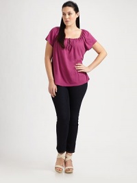 You are destined to find this ultra-soft supima cotton and micro modal top irresistible. This feminine top features a self-tie neckline with flattering gathered details.Self-tie gathered necklineShort sleevesCurved hemPull-on styleAbout 25 from shoulder to hem50% supima cotton/50% micro modalMachine washMade in USA You are destined to find this ultra-soft supima cotton and micro modal top irresistible. This feminine top features a self-tie neckline with flattering gathered details.Self-tie gathered necklineShort sleevesCurved hemPull-on styleAbout 25 from shoulder to hem50% supima cotton/50% micro modalMachine washMade in USA