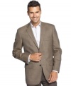 Give your dress look an extra layer of distinction with this handsome houndstooth blazer from Tasso Elba.