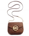 Inspired by the exotic, this ostrich-embossed crossbody from MICHAEL Michael Kors is posh and practical. Featuring signature detailing and chain-link accents, its hands free design delivers exquisite on-the-go accessorizing.