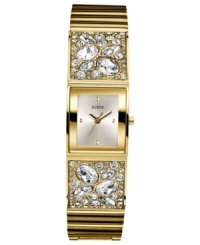 Golden glam, by GUESS. This stunning watch from GUESS flaunts a gold tone bangle bejeweled with sparkling crystals. Golden glam, by GUESS. This stunning watch from GUESS flaunts a gold tone bangle bejeweled with sparkling crystals.