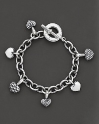 A chunky chain bracelet and studded heart charms give Lagos' sterling silver bracelet a hip appeal. Designed by Lagos. A chunky chain bracelet and studded heart charms give Lagos' sterling silver bracelet a hip appeal. Designed by Lagos.