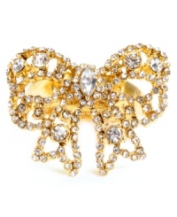 Adorn your digits with style that shines. Betsey Johnson's intricate bow ring is decorated with dozens of flashy clear crystals. Set in gold tone mixed metal. Ring stretches to fit finger.