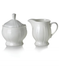 Sweeten any meal with this gracefully shaped sugar and creamer set. The soft geometric feel and clean, embossed design make it an essential part of the Antique White dinnerware and dishes collection from Mikasa. Shown at center right. Sweeten any meal with this gracefully shaped sugar and creamer set. The soft geometric feel and clean, embossed design make it an essential part of the Antique White dinnerware and dishes collection from Mikasa. Shown at center right.