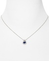 Elegant in its simplicity: delicate cubic zirconia stones surround a specially cut sapphire stone on this sterling silver Crislu pendant necklace - so perfect as a glittering final touch.