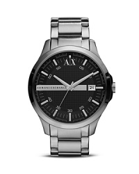 Crafted of sleek stainless steel this watch from Armani Exchange perfects easy-cool. The streamlined design is accented by a silvery stripe giving it a functional yet stylish finish.