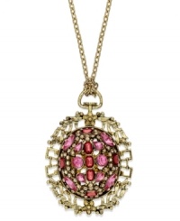 Unique, ornate and beautiful. This intricate pendant features pretty pink acrylic stones surrounded by detailed designs. Crafted in antiqued gold tone mixed metal. Approximate length: 30 inches + 2-inch extender. Approximate drop: 2-1/2 inches. Unique, ornate and beautiful. This intricate pendant features pretty pink acrylic stones surrounded by detailed designs. Crafted in antiqued gold tone mixed metal. Approximate length: 30 inches + 2-inch extender. Approximate drop: 2-1/2 inches.