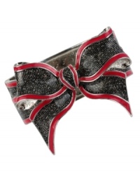 Beautiful bow. Betsey Johnson creates a whimsical centerpiece for this bangle, crafted from silver-tone mixed metal with a bow and silver glitter to dress it up. Approximate diameter: 2-1/2 inches. Approximate drop: 2 inches. Large Bow Hinged Bangle Bracelet Bow Drop 2 metal w/rhodium plating 2-1/2 diameter silver tone bangle bracelet with silver glitter and fuchsia bow metal Beautiful bow. Betsey Johnson creates a whimsical centerpiece for this bangle, crafted from silver-tone mixed metal with a bow and silver glitter to dress it up. Approximate diameter: 2-1/2 inches. Approximate drop: 2 inches. Large Bow Hinged Bangle Bracelet Bow Drop 2 metal w/rhodium plating 2-1/2 diameter silver tone bangle bracelet with silver glitter and fuchsia bow metal