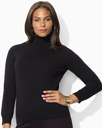 The ultimate in understated elegance, a chic turtleneck is crafted from soft combed cotton and accented with Ralph Lauren's iconic monogram.