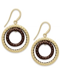 Look lovely in loops. These drop earrings from Alfani stun with gold and hematite hues, found on two circular loops. Crafted in gold tone mixed metal. Approximate drop: 1 inch. Look lovely in loops. These drop earrings from Alfani stun with gold and hematite hues, found on two circular loops. Crafted in gold tone mixed metal. Approximate drop: 1 inch.