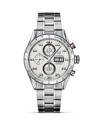 TAG Heuer's Carrera series has epitomized racing chronographs since its introduction nearly 50 years ago. This model features a white dial featuring three subdials and a day-date window on a steel bracelet with a double safety clasp. The 43mm case features anti-reflective saphire crystal as well as a sapphire crystal display caseback. TAG Heuer's Carrera series has epitomized racing chronographs since its introduction nearly 50 years ago. This model features a white dial featuring three subdials and a day-date window on a steel bracelet with a double safety clasp. The 43mm case features anti-reflective saphire crystal as well as a sapphire crystal display caseback.
