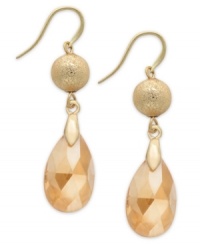 A graceful teardrop silhouette lends a lovely look to these Alfani earrings. The shimmering glass stone adds a serene touch. Crafted in gold tone mixed metal. Approximate drop: 1-1/8 inches. A graceful teardrop silhouette lends a lovely look to these Alfani earrings. The shimmering glass stone adds a serene touch. Crafted in gold tone mixed metal. Approximate drop: 1-1/8 inches.