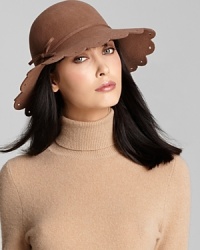 Sweet scalloped detailing and cut-outs along the brim lend this San Diego Hat Company design feminine appeal. Sweet scalloped detailing and cut-outs along the brim lend this San Diego Hat Company design feminine appeal.