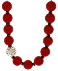Red haute. This necklace from Haskell is crafted from gold-tone mixed metal with black faceted spacers breaking up the red glass beads. The gold-tone and glass bead adds a stylish touch. Approximate length: 20 inches + 3-inch extender. Approximate drop: 9/10 inch.