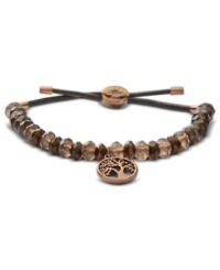 The smoky beads on this Fossil bracelet add allure to a casual style. An adjustable chocolate brown leather cord holds it all together. Includes a brown ion-plated coin charm. Approximate diameter: 2-1/4 inches. The smoky beads on this Fossil bracelet add allure to a casual style. An adjustable chocolate brown leather cord holds it all together. Includes a brown ion-plated coin charm. Approximate diameter: 2-1/4 inches.