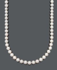 A simple strand of pearls exudes effortless elegance. Belle de Mer necklace features AA+ cultured freshwater pearls (11-12 mm) with a 14k gold clasp. Approximate length: 22 inches.