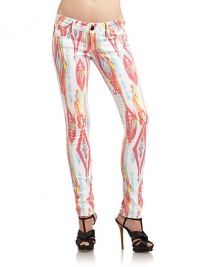 THE LOOKTonal ikat printWide waistband with belt loopsFront button closure with zip flyFive-pocket styleRemovable logo charm at belt loopSkinny legsPyramid studs at back pocketTHE FITRise, about 7Inseam, about 28THE MATERIAL43% lyocell/26% cotton/17% rayon/13% polyester/1% spandexCARE & ORIGINMachine washImported of domestic fabricModel shown is 5'10 (177cm) wearing US size 4. THE LOOKTonal ikat printWide waistband with belt loopsFront button closure with zip flyFive-pocket styleRemovable logo charm at belt loopSkinny legsPyramid studs at back pocketTHE FITRise, about 7Inseam, about 28THE MATERIAL43% lyocell/26% cotton/17% rayon/13% polyester/1% spandexCARE & ORIGINMachine washImported of domestic fabricModel shown is 5'10 (177cm) wearing US size 4.