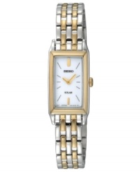 Set a standard for sophistication. Watch by Seiko crafted of two-tone stainless steel bracelet and rectangular case with gold tone bezel, 15mm. White solar-powered dial features applied gold tone stick indices at twelve and six o'clock, two hands and logo. Quartz movement. Water resistant to 30 meters. Three-year limited warranty. Set a standard for sophistication. Watch by Seiko crafted of two-tone stainless steel bracelet and rectangular case with gold tone bezel, 15mm. White solar-powered dial features applied gold tone stick indices at twelve and six o'clock, two hands and logo. Quartz movement. Water resistant to 30 meters. Three-year limited warranty.