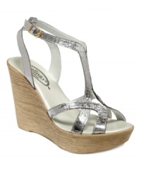 Monaco wedge sandals by Callisto are a unique take on the t-strap silhouette. A super tall wedge heel adds extra height. Monaco wedge sandals by Callisto are a unique take on the t-strap silhouette. A super tall wedge heel adds extra height.