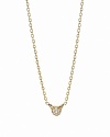 A delicate diamond pavé pendant adorns PANDORA's 18K gold necklace.