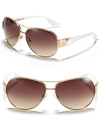 Sleek and stylish aviators in a classic silhouette with a double bridge design and clear arms. Sleek and stylish aviators in a classic silhouette with a double bridge design and clear arms.