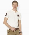 A trim-fitting polo shirt is crafted from breathable cotton mesh with Ralph Lauren's Big Pony at the chest for an iconic finish.