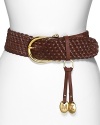 Gleaming gold hardware adds rich tonal interest to braided leather. By MICHAEL Michael Kors.