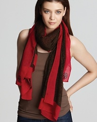 Go wild for this leopard printed scarf with a bright red contrast border. Go wild for this leopard printed scarf with a bright red contrast border.