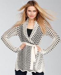 The bold patterns on INC's cardigan lend a graphic look to a classic piece. A scalloped adds feminine polish. The bold patterns on INC's cardigan lend a graphic look to a classic piece. A scalloped adds feminine polish.