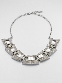 This bib silhouette, encrusted with Swarovski crystals, is destined to make a bold statement. Swarovski crystalsSterling silverplated brassLength, about 15.75Lobster closureMade in Italy This bib silhouette, encrusted with Swarovski crystals, is destined to make a bold statement. Swarovski crystalsSterling silverplated brassLength, about 15.75Lobster closureMade in Italy