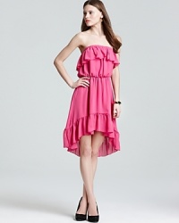 Pretty ruffles at the neckline and hem of this Sweet Pea dress create a delightful look for the balmy season. Hit the dance floor come your next fabulous fête and look fabulous all the while! Pretty ruffles at the neckline and hem of this Sweet Pea dress create a delightful look for the balmy season. Hit the dance floor come your next fabulous fête and look fabulous all the while!
