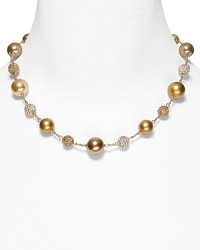 Carolee's necklace with alternating plain and pave beads lends a chic, sparkling finish to your look. Carolee's necklace with alternating plain and pave beads lends a chic, sparkling finish to your look.