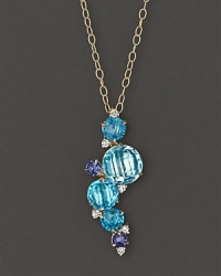A brilliant fall of faceted iolite, blue topaz and diamond adds bright color to gleaming 18K yellow gold. By Carelle. A brilliant fall of faceted iolite, blue topaz and diamond adds bright color to gleaming 18K yellow gold. By Carelle.