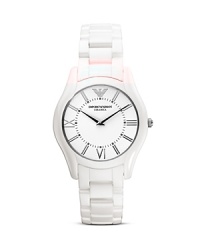 Do the white thing with Emporio Armani's ceramic bracelet. With clean lines and a feminine dial, this au courrant timepiece is a day-to-day option with style points. Do the white thing with Emporio Armani's ceramic bracelet. With clean lines and a feminine dial, this au courrant timepiece is a day-to-day option with style points.