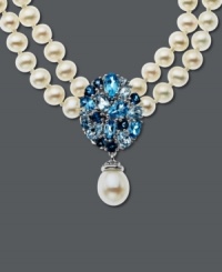 Two rows of shimmer and shine. This polished style features pear-cut blue topaz (4 ct. t.w.), sparkling white topaz accents and strands of cultured freshwater pearls (8 mm x 10mm). Set in sterling silver. Approximate length: 17 inches. Approximate drop: 1-1/4 inches. Two rows of shimmer and shine. This polished style features pear-cut blue topaz (4 ct. t.w.), sparkling white topaz accents and strands of cultured freshwater pearls (8 mm x 10mm). Set in sterling silver. Approximate length: 17 inches. Approximate drop: 1-1/4 inches.