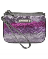 Discover your inner glam-azon with this shimmery little lovely from Nine West. Decked out in boldly-hued sequin with convenient wristlet strap, it's perfectly sized to stash just the essentials. Discover your inner glam-azon with this shimmery little lovely from Nine West. Decked out in boldly-hued sequin with convenient wristlet strap, it's perfectly sized to stash just the essentials.