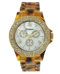 Add a preppy element to your look with this chic tortoise watch by Style&co. Tortoise plastic bracelet and round case. Gold tone mixed metal bezel embellished with crystal accents. Mother-of-pearl dial features gold tone numerals at twelve, four and eight o'clock, stick indices, minute track, three multifunctional subdials, three hands and logo. Quartz movement. Two-year limited warranty. Add a preppy element to your look with this chic tortoise watch by Style&co. Tortoise plastic bracelet and round case. Gold tone mixed metal bezel embellished with crystal accents. Mother-of-pearl dial features gold tone numerals at twelve, four and eight o'clock, stick indices, minute track, three multifunctional subdials, three hands and logo. Quartz movement. Two-year limited warranty.