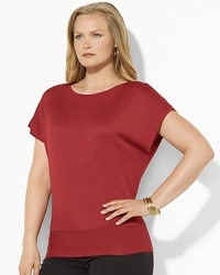 Rendered in sumptuous tussah silk, a boatneck top is finished with short dolman sleeves for a modern look. Rendered in sumptuous tussah silk, a boatneck top is finished with short dolman sleeves for a modern look.