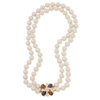 Double the elegance. Carolee's double-strand plastic pearl necklace is finished with a colorful pendant made with epoxy stones. Crafted with 12k gold-plated mixed metal. Approximate length: 18 inches. Double the elegance. Carolee's double-strand plastic pearl necklace is finished with a colorful pendant made with epoxy stones. Crafted with 12k gold-plated mixed metal. Approximate length: 18 inches.