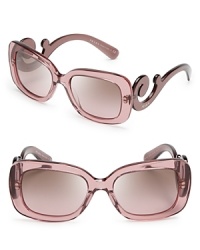 Go for Baroque in Prada's over-the-top sunglasses with statement-making arms. Go for Baroque in Prada's over-the-top sunglasses with statement-making arms.