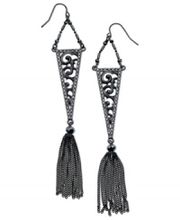 Ornate elegance. This pair of drop earrings from GUESS is crafted from hematite-tone mixed metal with glass crystal tassels and a filigree pattern for a refined touch. Approximate drop: 3-1/4 inches. Approximate diameter: 3/4 inch. Ornate elegance. This pair of drop earrings from GUESS is crafted from hematite-tone mixed metal with glass crystal tassels and a filigree pattern for a refined touch. Approximate drop: 3-1/4 inches. Approximate diameter: 3/4 inch.